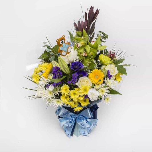 <p>Congratulate the proud parents with a delightful bouquet in shades of blue and white. Makes a beautiful gift to celebrate the birth of a baby boy. Wrapped up in baby blue netting and including Baby Boy Decorations.</p>