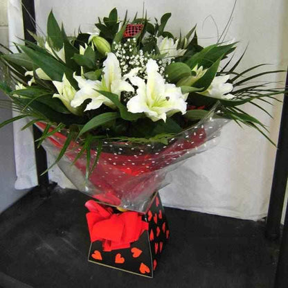 <p>A gorgeous collection of the finest large headed long stemmed Orential Lilies, hand-tied with Gypsophila and Tropical Foliage.</p><p>Traditionally lilies represent innocence and purity with the more modern connotations being honour and aspiration!</p><p>Beautifully wrapped in seasonial wrapping and beautifully presented in a presentation box, an outstanding gift!</p>