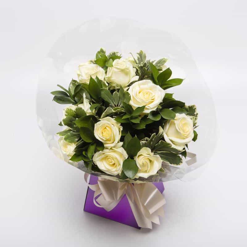 <p>Sending a Dozen Roses says it all! Express just how you feel to someone special with one dozen roses! </p><p>White roses are traditionally associated with marriages and new beginnings, their quiet beauty has also made them a gesture of remembrance. A bouquet of white roses is a prefect way to say - i'm thinking of you!</p><p>We expertly hand-tie these stately roses with brilliant white Gypsophila and tropical foliage, wrap them and present them in a gorgeous presentaion box for the world to enjoy.</p>