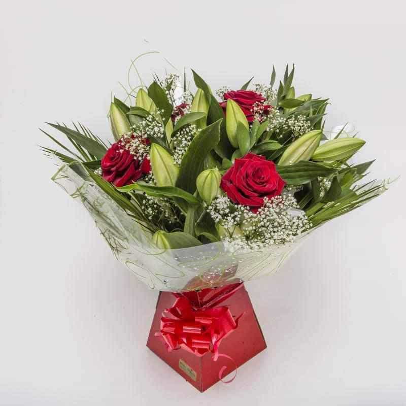 <p>The Best of Both Worlds, if your unsure which to buy simply buy both!</p><p>Gorgeous Red Velvet smooth long stem Gran Prix Roses and luxurious Orential Lilies expertly hand-tied, wrapped in seasonial wrapping and skillfully presented in a proud presentation box create this superb gift.</p><p>Ideal for all occasions.</p>